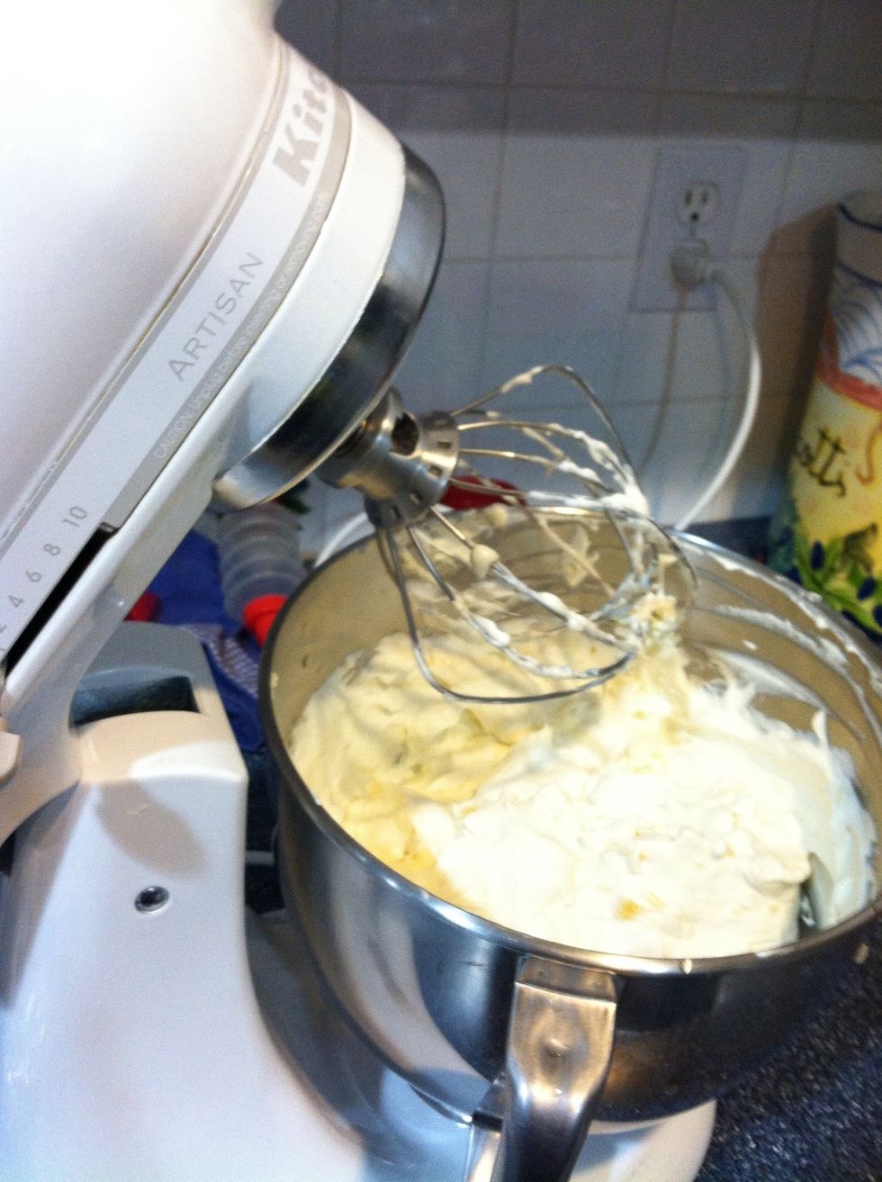 Then mix the whipped cream in with the cream cheese/sugar and add the vanilla extract.