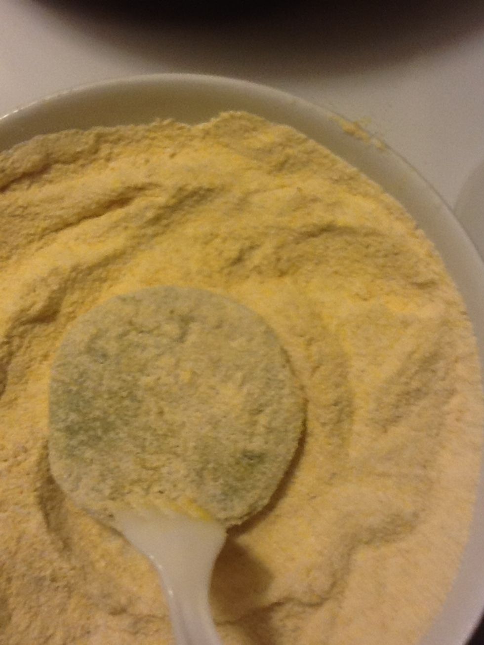 Then mix tomato with cornmeal mixture.