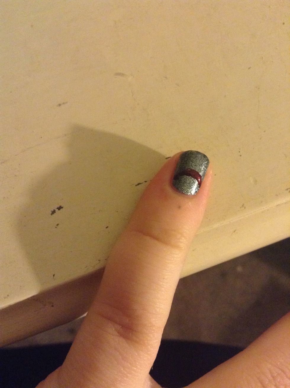 Then on my pinkie I did a half moon. I did my half circle freehand (which I'm very proud of) but you can use a hole reinforcement label, or any circle shaped sticker.