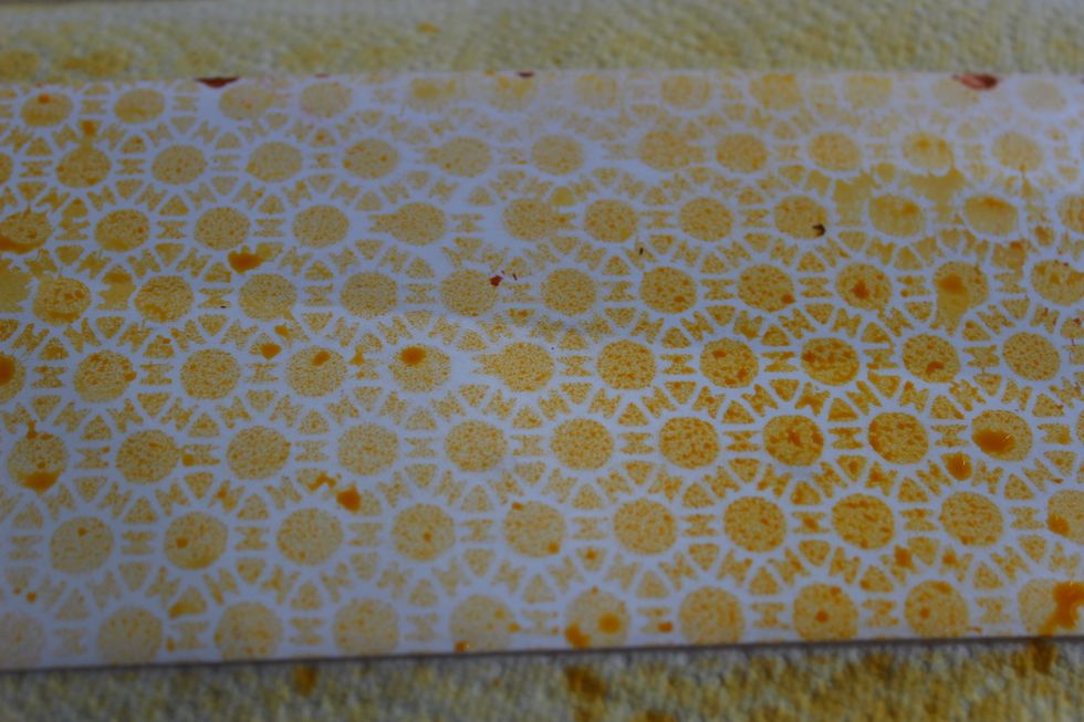 Then on one if the paper pages I used a stencil and misted over it with Colorations in Timeless.