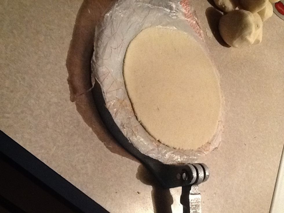 Then open it and take the top plastic off and you should have a tortilla like this