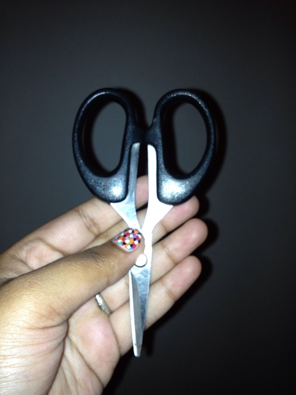 Then, open the bottle and clean the excess polish off the brush. Cut the brush to your desired thickness.