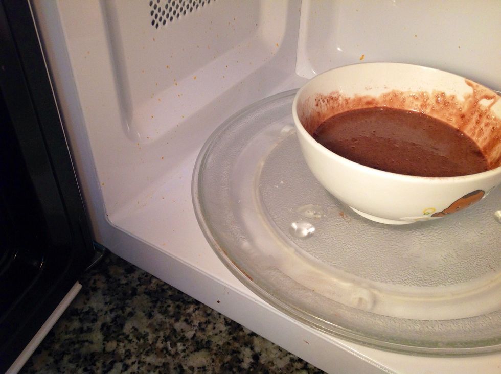 Then, open the door of your microwave and put it in the centre.