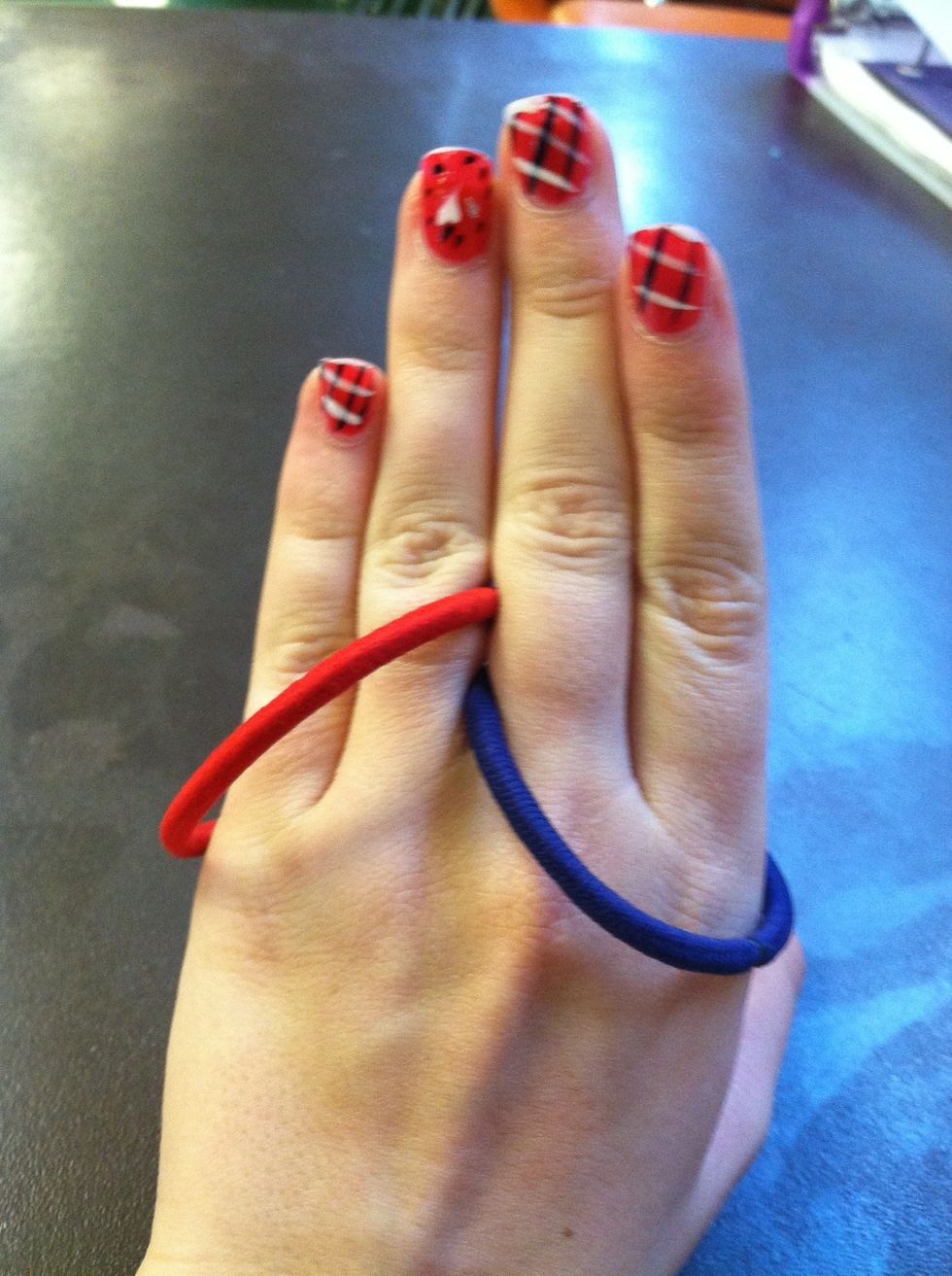 Then open your hand quickly and they will switch.