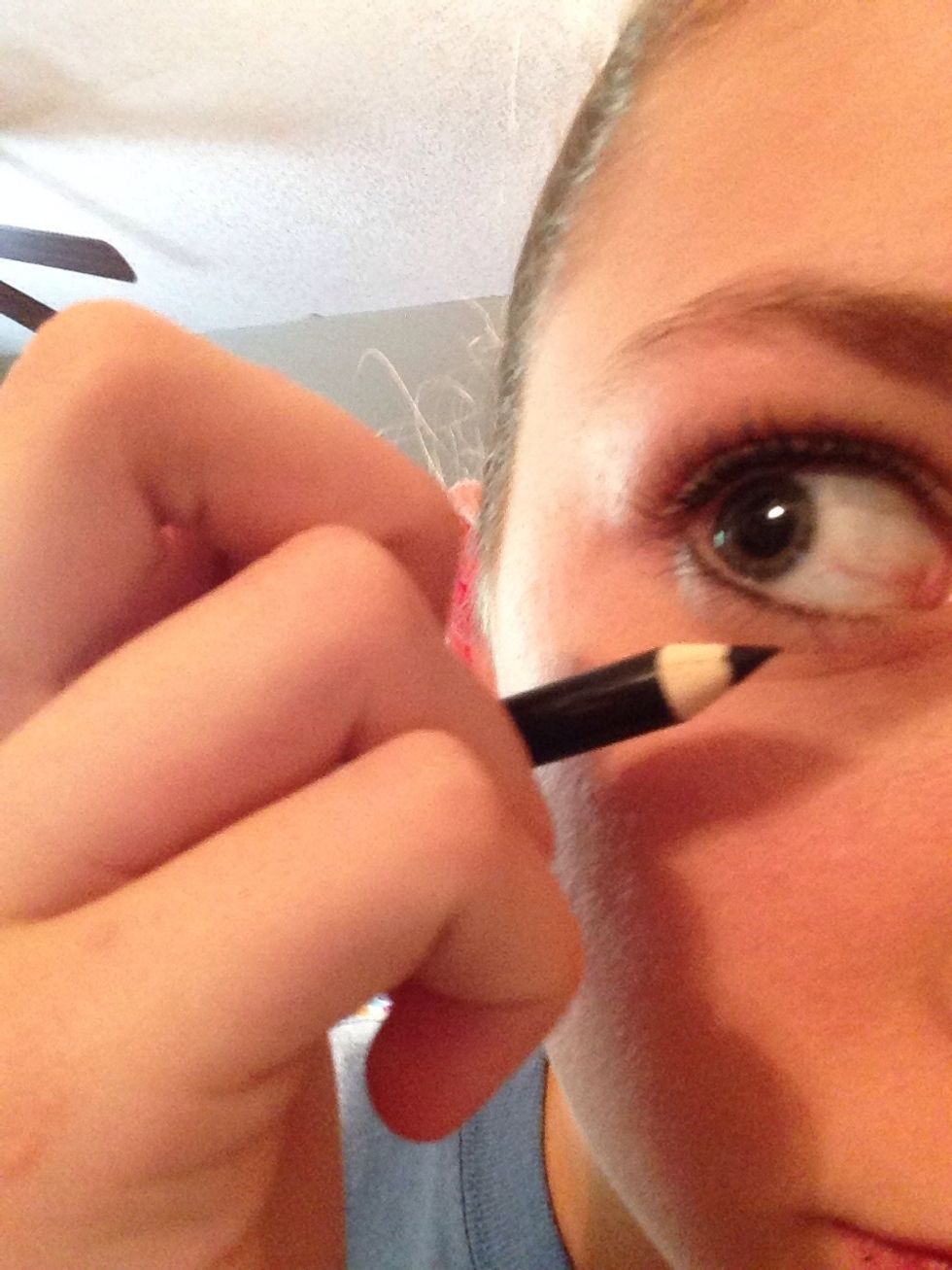 Then out eyeliner on bottom waterline and top waterline