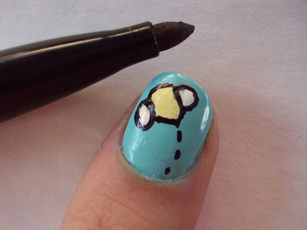 then out line the bee's body. make it pointy at the bottom the the bee like a stinger