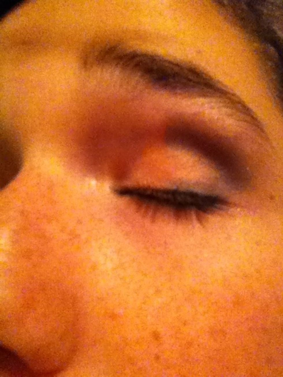 Then out line the end of the orange with some blue eyeshadow.