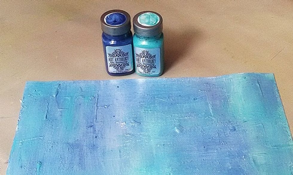 Then paint all paper with blue tint.