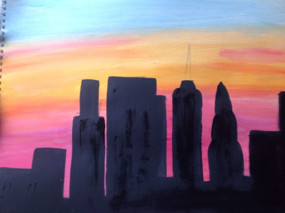 Then, paint all the buildings black. You'll have to do at least two coats.