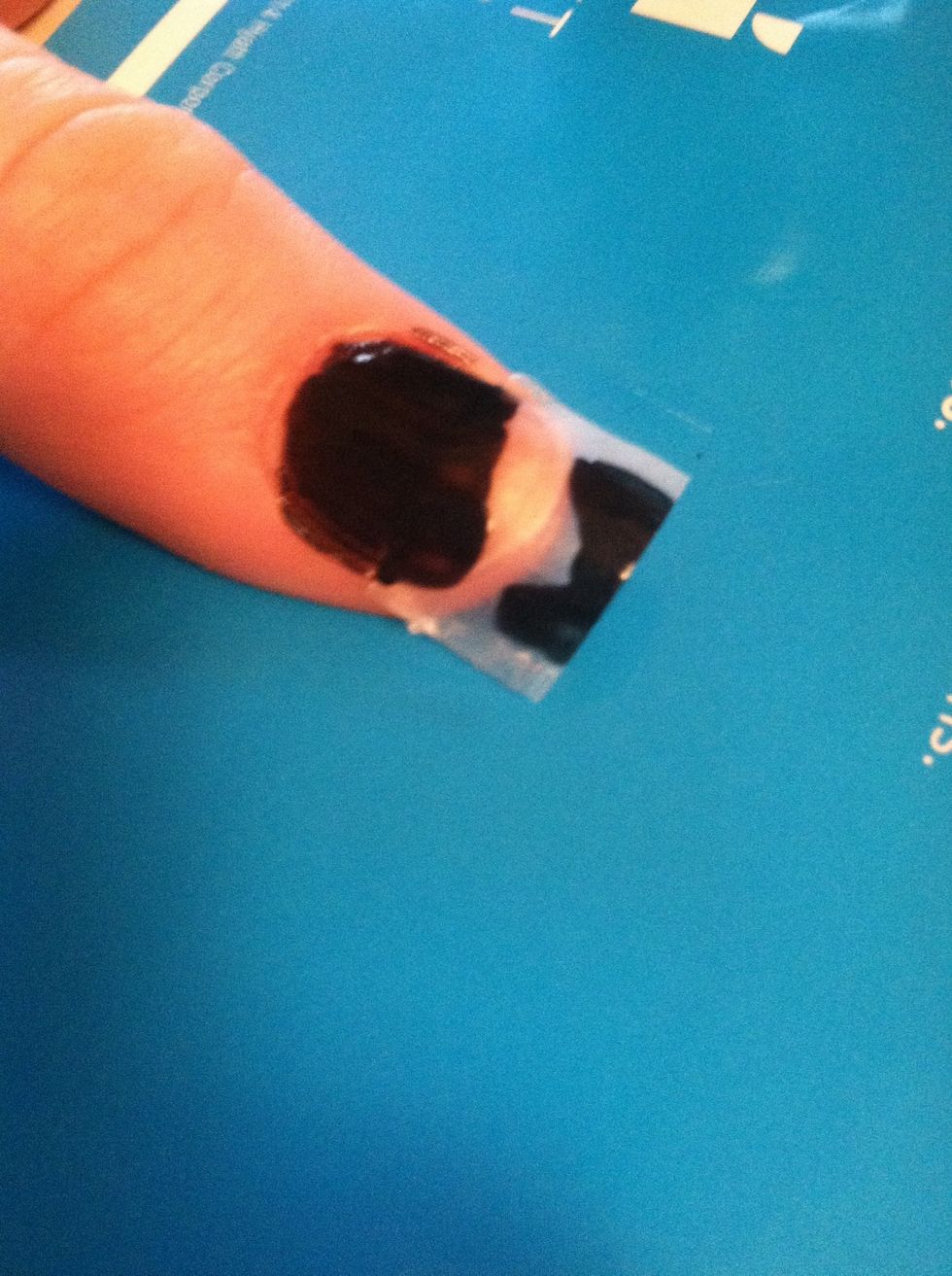 Then paint the exposed area black. TAKE THE TAPE OFF IMMEDIATELY AFTER YOU PAINT. Or else it will mess up really badly.