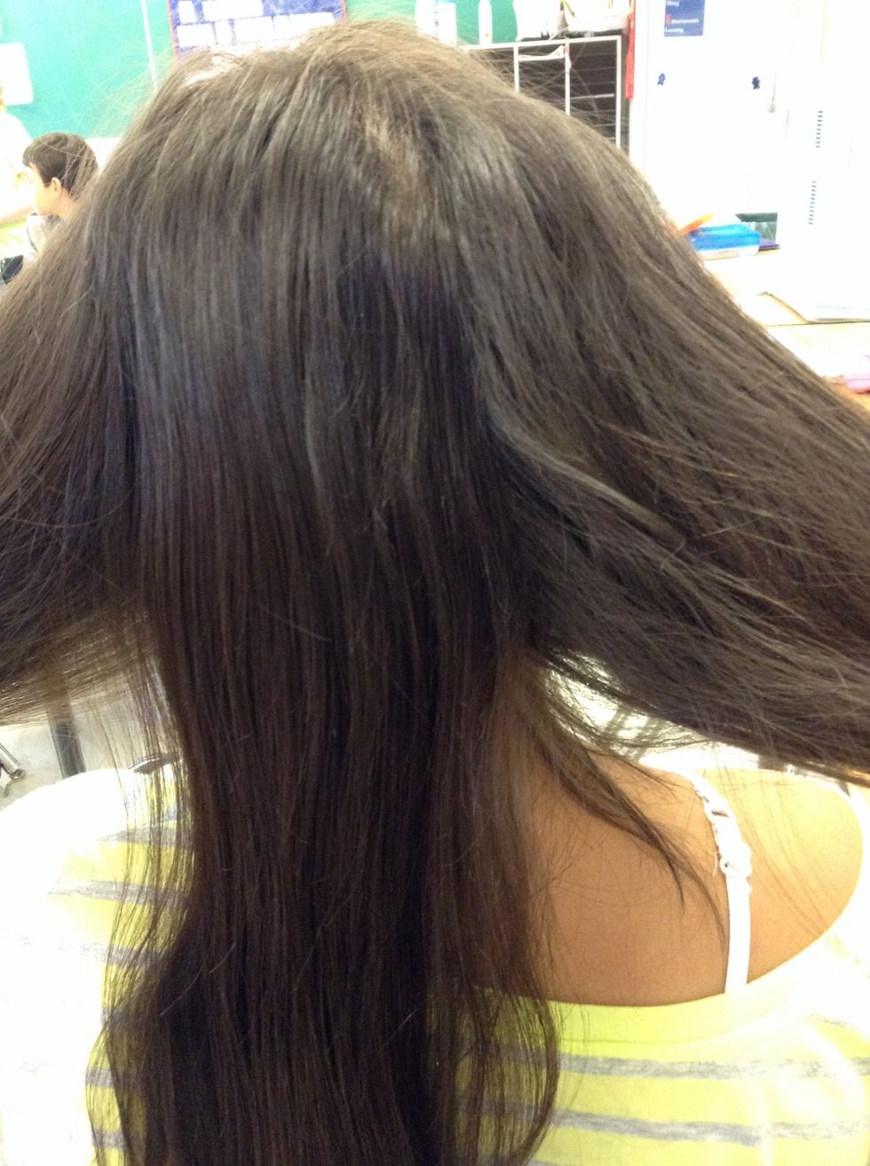 Then, part your hair into three sections.