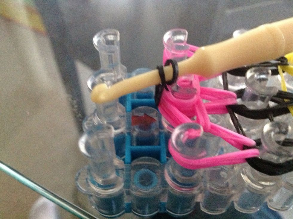 Then pick it up with the hook like this