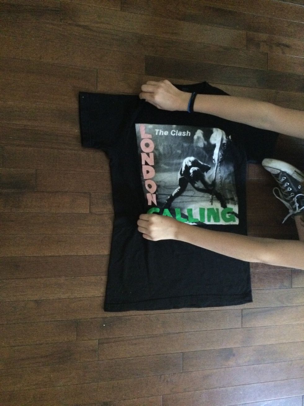 Then pinch at the top of the shirt straight above where your other hand is pinching