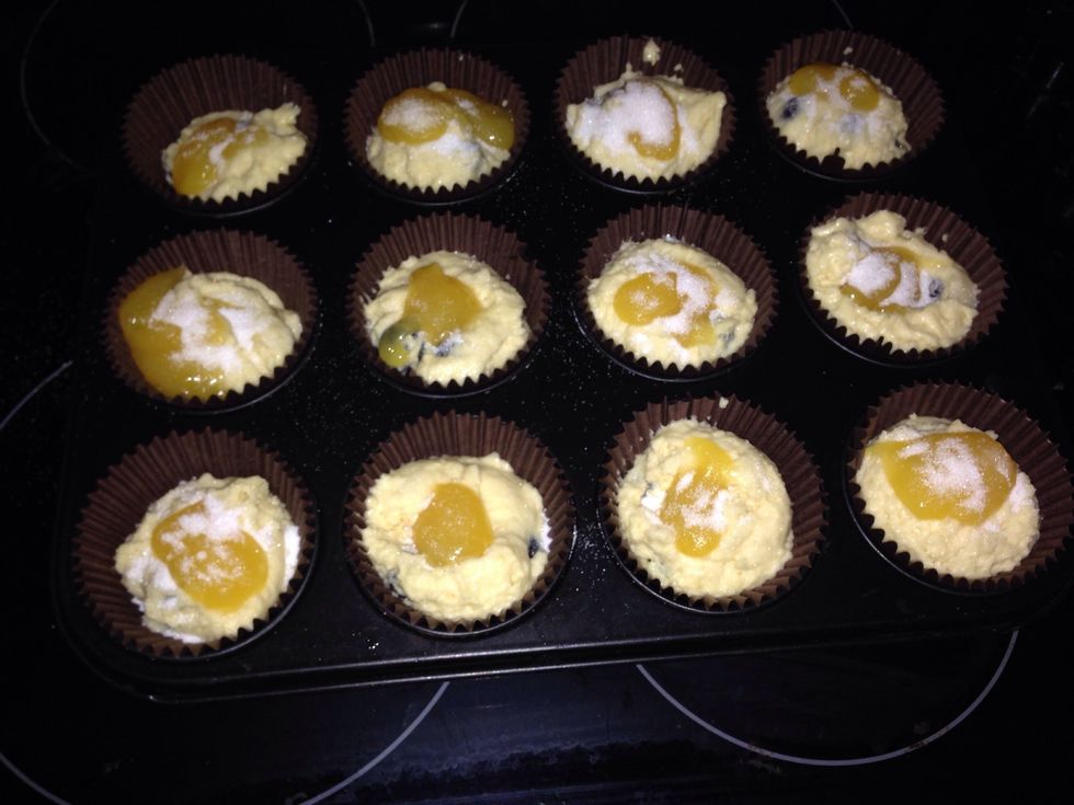 Then place a tsp of lemon curd on top and scatter a little sugar ontop and bake for 17-20 minutes untill golden brown