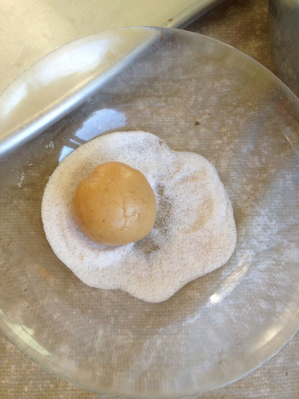 Then place dough in sugar