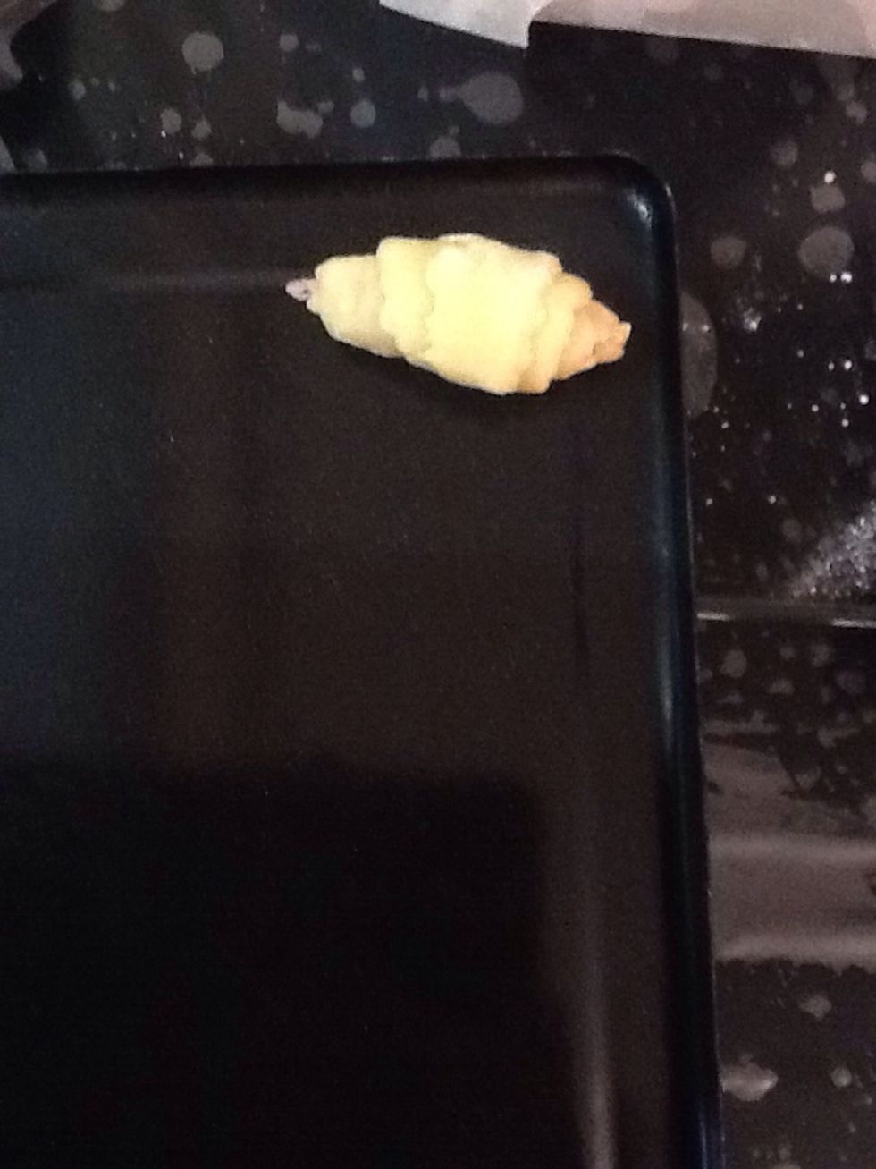 Then place onto a baking tray and continue with the rest of the dough strips