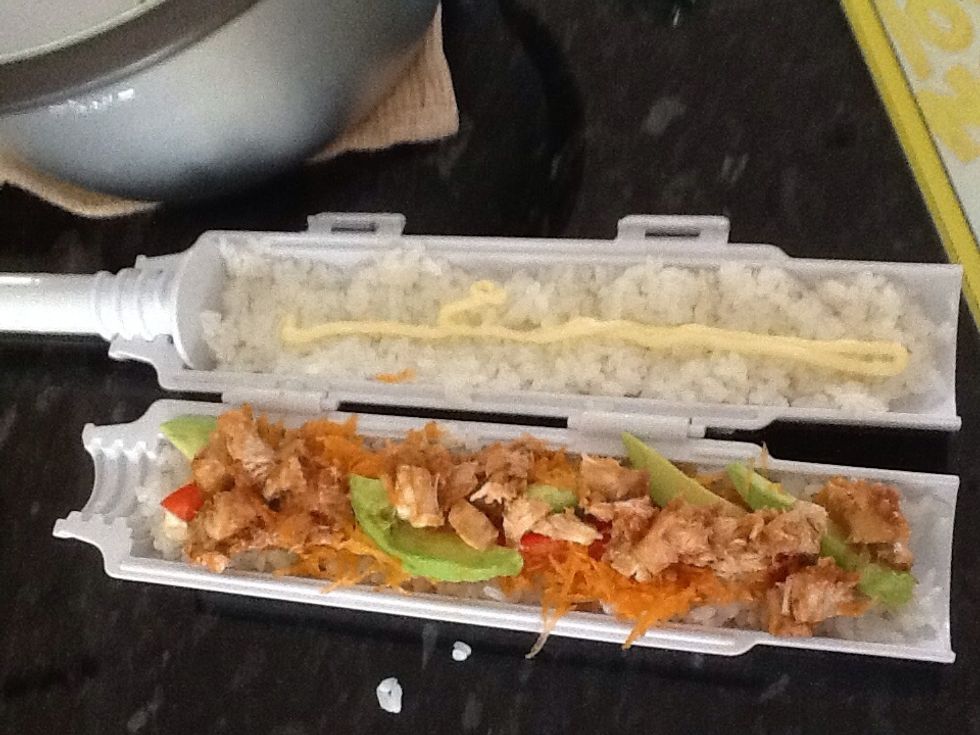 Then place the ingredients evenly along one side. Roughly even placing to ensure each piece has a bit of everything in it.