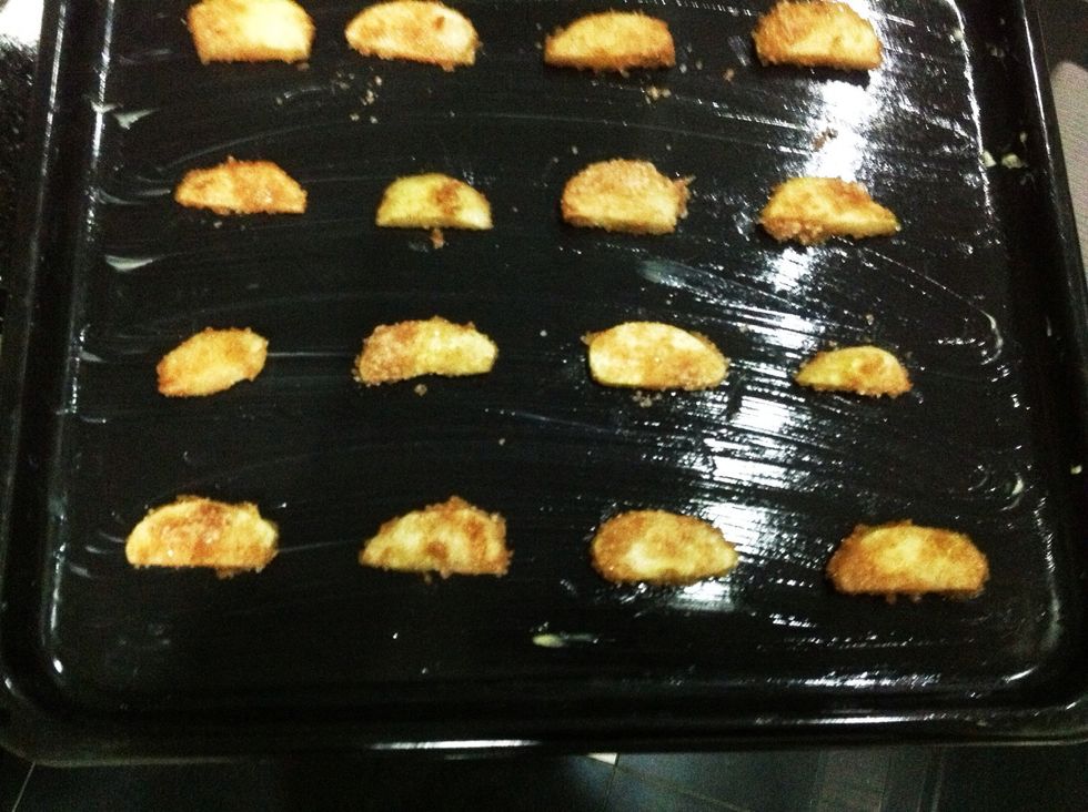 Then, place them on a VERY WELL GREASED baking sheet. I greased it with butter. Bake it for 12-15 minutes then let cool (at least 10 minutes) until ready to assemble.