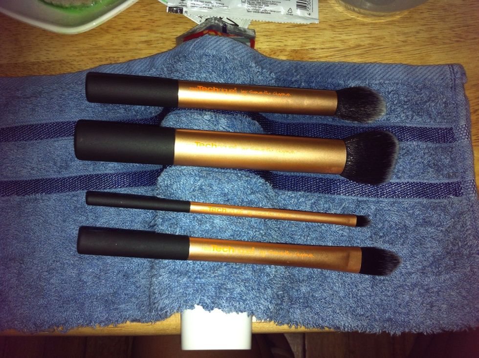 Then place your brushes on the towel, as seen on the photo above. It should look like mini see-saws on a towel.\ud83d\ude01 This keeps the water out of the part where the bristles are attached on the handle.