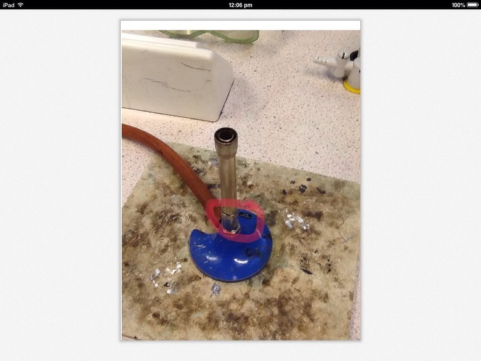 Then place your Bunsen burner on your safety mat and make sure the valv is shut wich means it is on safety