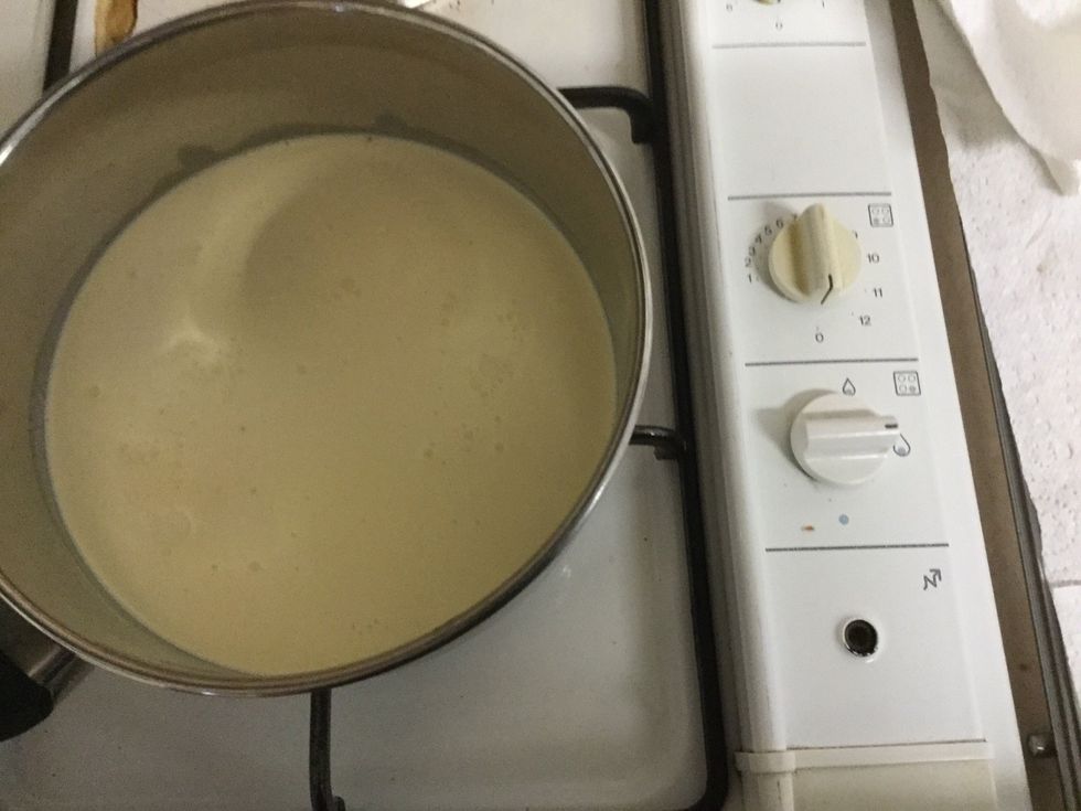 Then place your cream in the pan over the stove on medium heat.