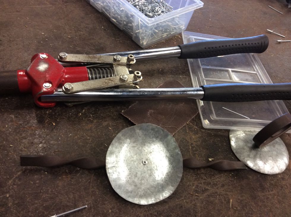 Then pop rivet the wax catcher on the top.