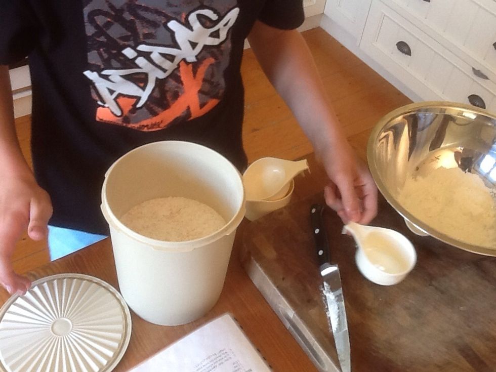 Then pour 1/2 a cup of wholemeal self raising flour into the bowl.