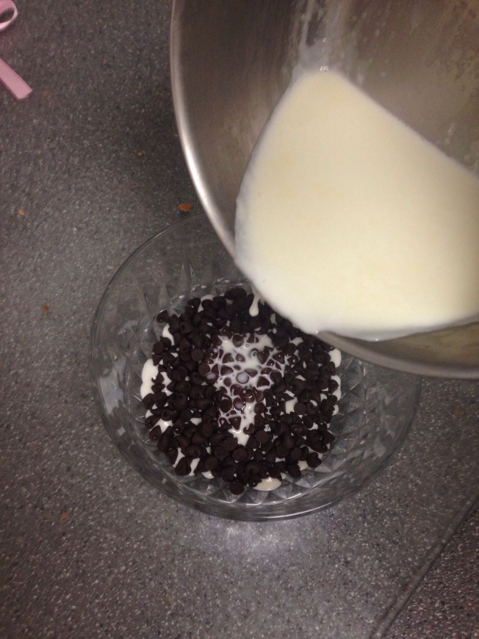 then pour cream over chocolate chips (be aware of amount!!! will not use ALL cream!!) pour until there is slightly less cream than chocolate chips.