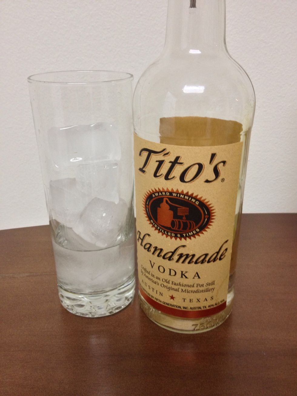 Then, pour in 1 1/4 ounces (a shot) of your favorite Vodka.