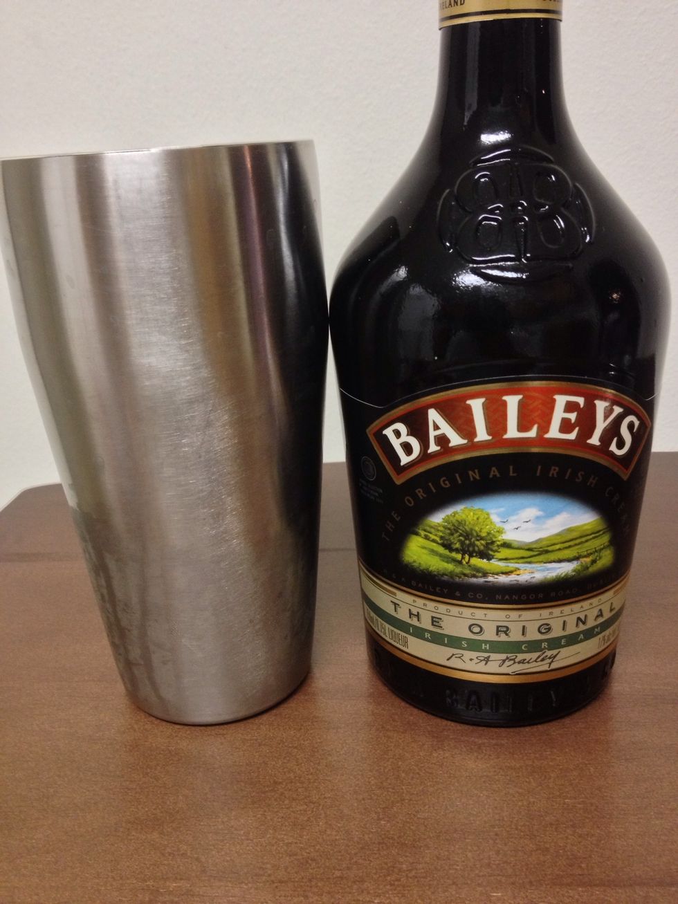 Then, pour in a half ounce of Baileys Irish Cream.