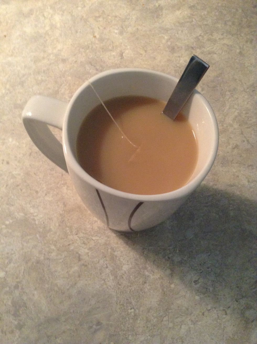 Then pour in half a quarter of milk or until a light brown colour. Don't forget to stir it!