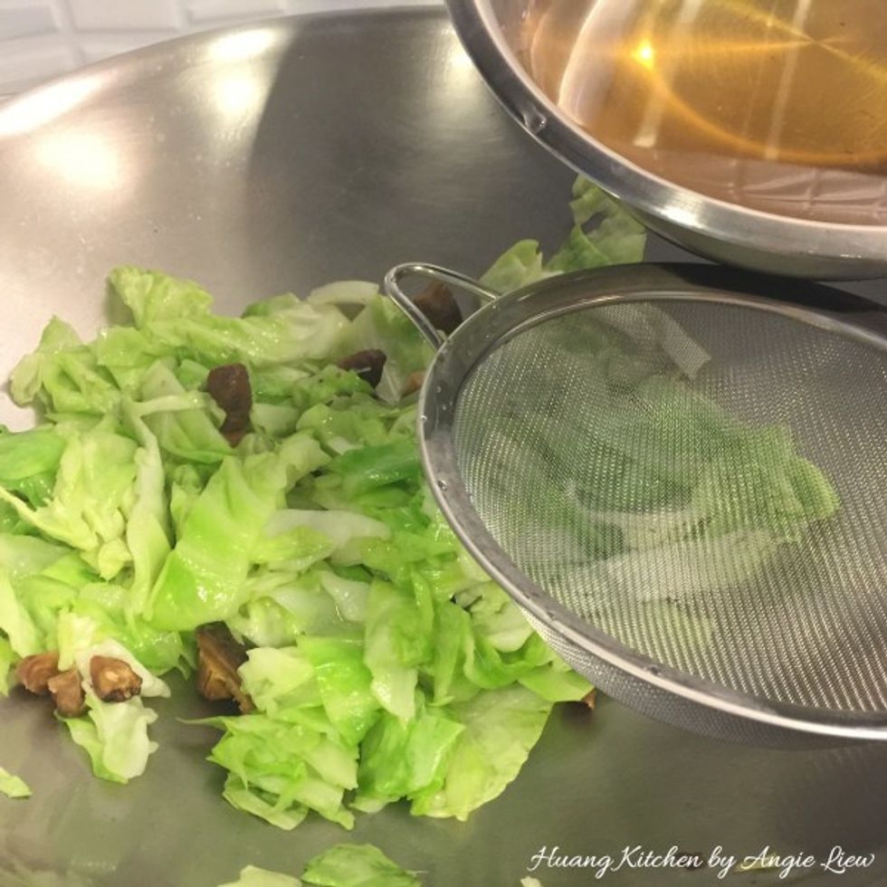Then pour in strained mushroom water.