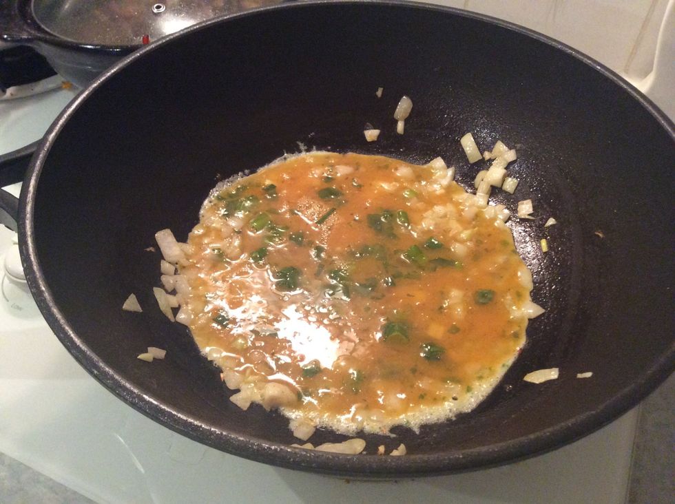 Then pour the egg mixture into the pan and continue to stir