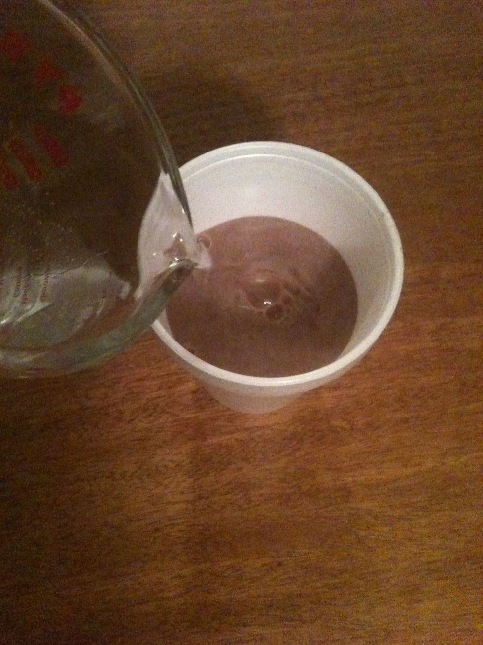 Then, pour the hot water or milk into the mug/cup. Be careful not to pour too much, or you may run Into trouble when stirring.