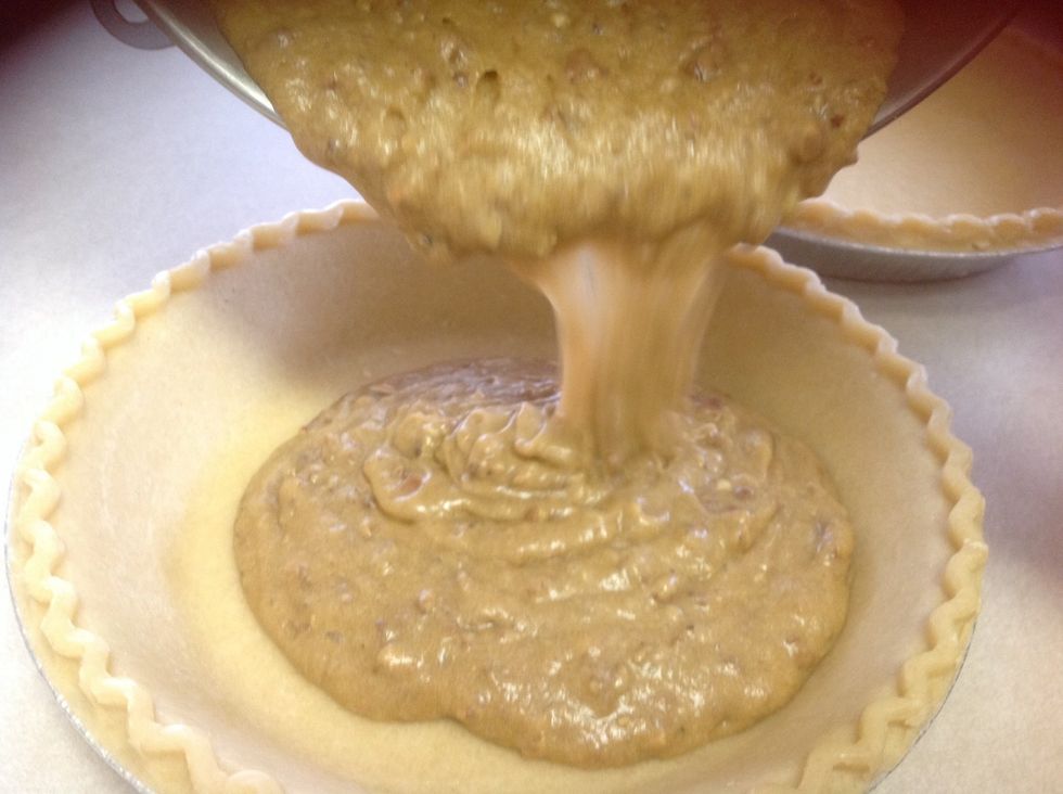 Then pour the mix into 2 deep dish pie crusts!