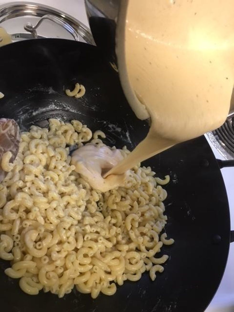 Then pour the rest of the cheese sauce over the noodles.