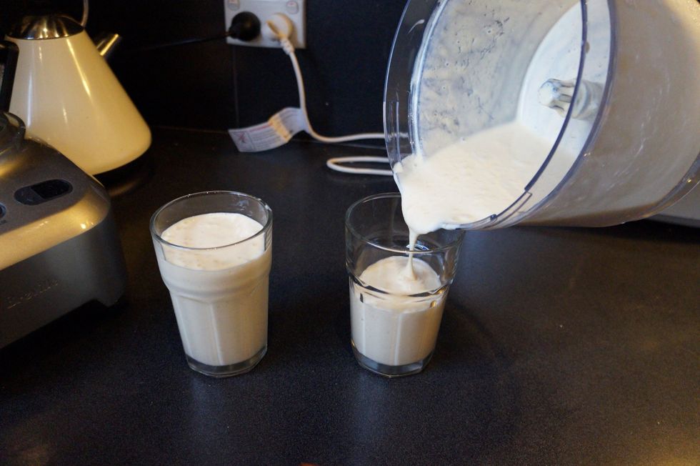 then pour your mango lassi into 2 glasses and it's ready to serve