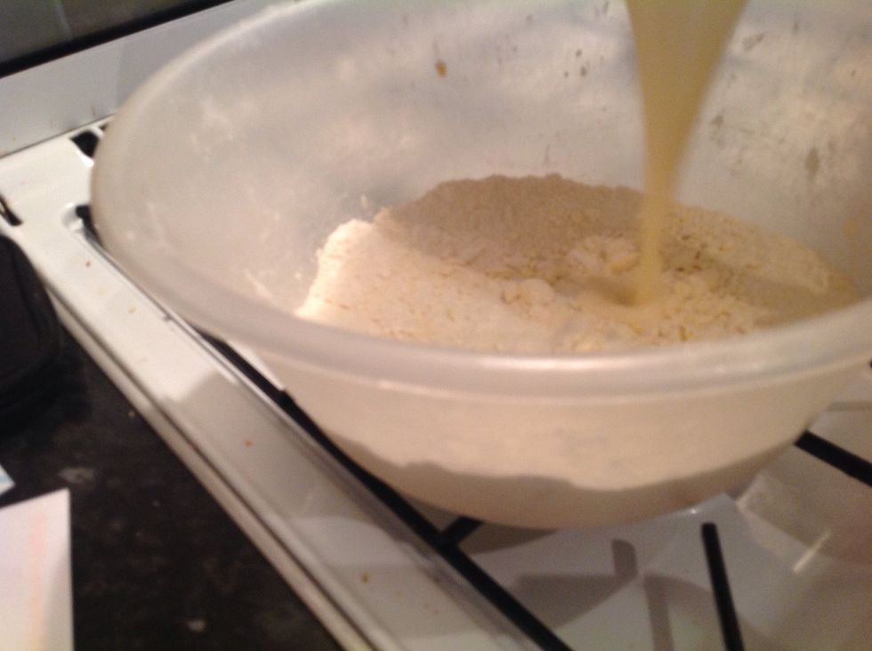 Then pour your milk and eggs into the flour