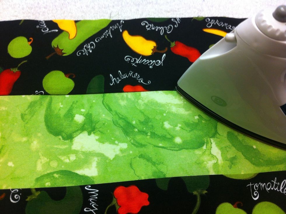 Then press AGAIN on the right side of fabric.