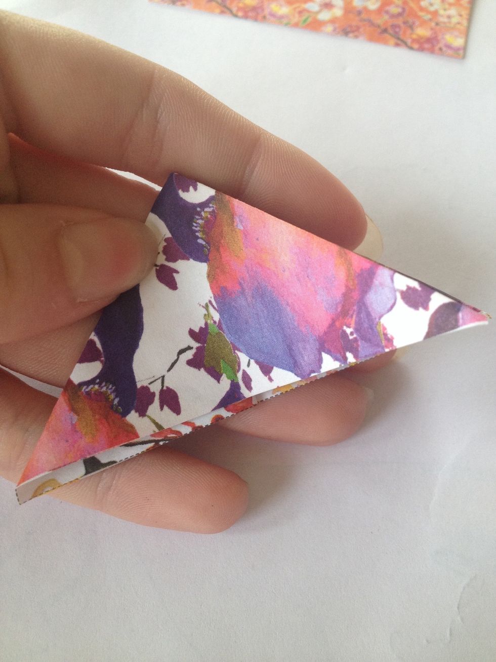 Then press down into a triangle