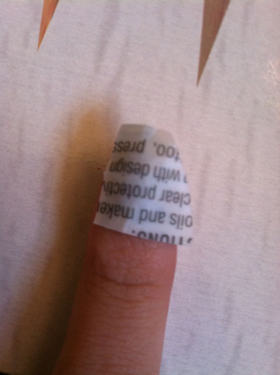 Then press on nail! Remember if you want to do a base coat in a certain color let it dry then apply wet tattoo. :)