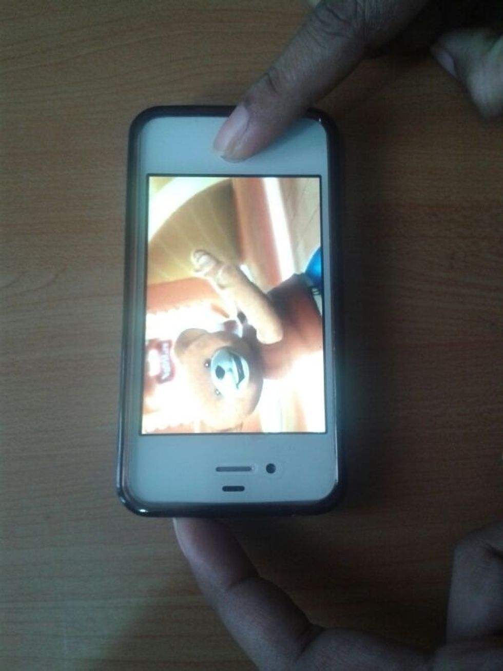 Then press the home and sleep button at the same time...note that i have turned my cell across to give you a complete pic