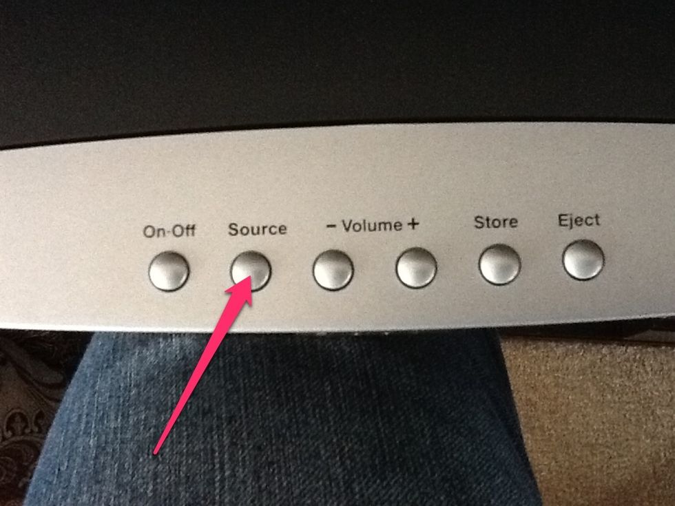 Then press the Source button on the DVD player to cycle through the options.