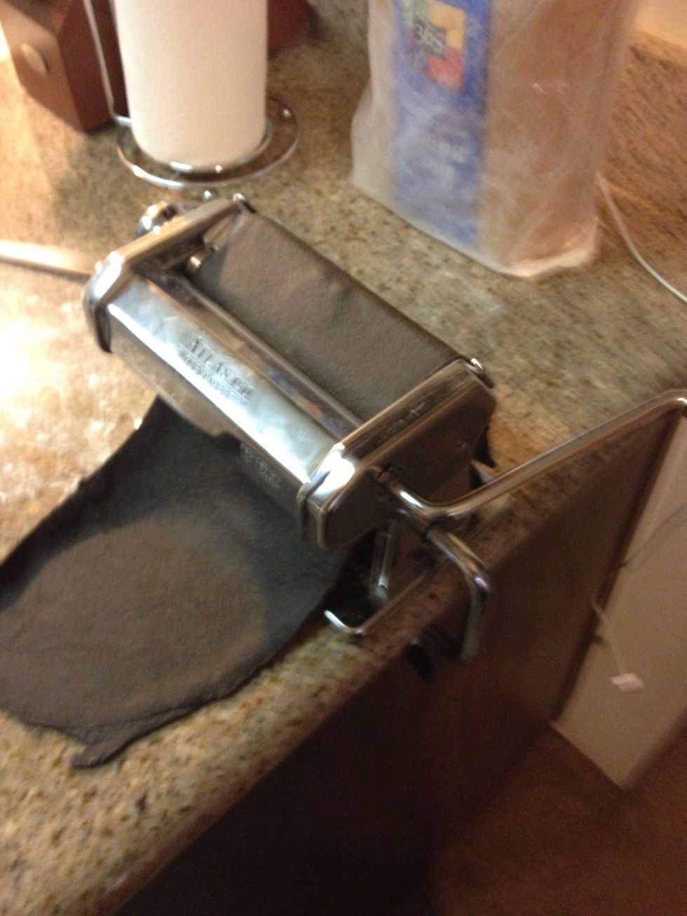 Then progressively run dough through thinner settings one pass for each setting. I rolled it out to #6. Add flour to machine and dough if sticking to rollers.