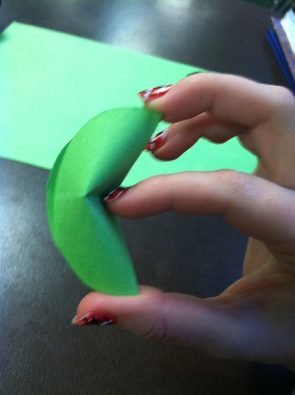 Then pull back on the top and bottom and push with another finger at the same time slowly to bend it into shape. Sometimes it will fold funny.