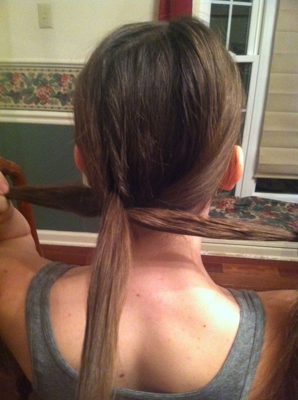 Then pull the middle piece behind the left and right pieces\ud83c\udf6c