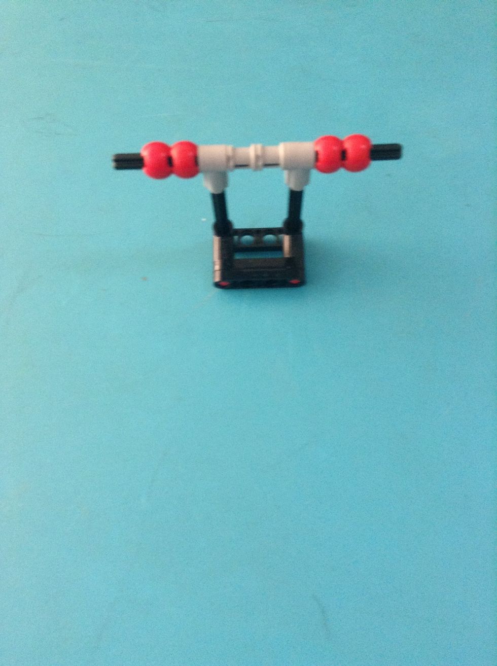 Then push on two of the pieces at the bottom of the swing
