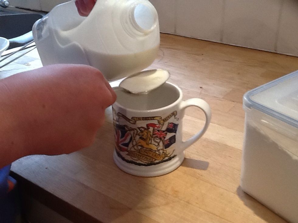 Then put a table spoon of milk in a mug and put it in the micro wave for 15seconds