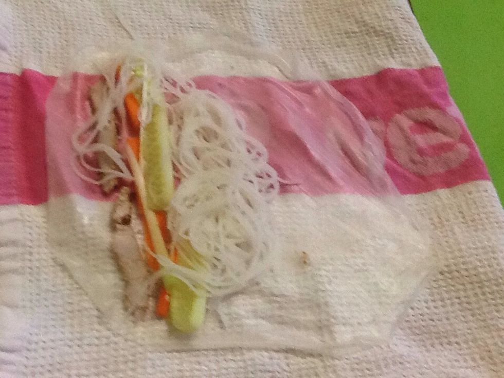 Then put all the filling in the sheet and then fold the top and the bottom of the sheet so the fillings don't fall out the wrap up the roll.
