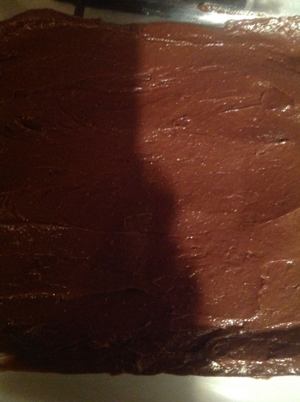 Then put brownie mix in pan and spread out